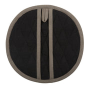 Sir|Madam Linen Pot Holder - Single - Faded Black, a circular linen kitchen mitt, acts as both an oven glove and trivet, enhancing kitchen elegance.