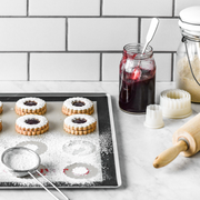 de Buyer | Pastry Cutters - Square, featuring nine fluted and square food-grade polyamide cutters, perfect for crafting precise pastries, ideal for both professional and home bakers.