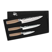 Shun | Premier 3-Piece Starter Set - Blonde features three Japanese-style kitchen knives with hammered blades and light wood handles in a presentation gift box.